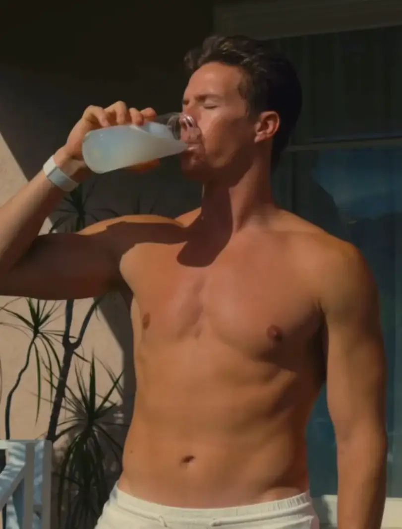Man drinking from an ARMRA carafe